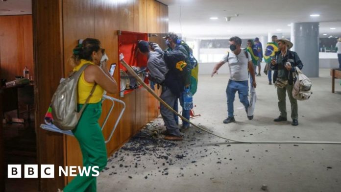 brazil-riots:-first-man-tried-for-storming-government-buildings-gets-17-years